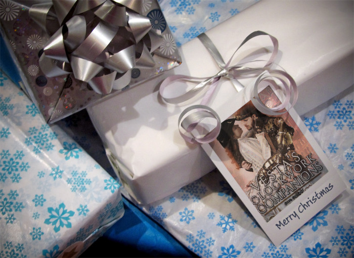 Merry Christmas banner with Vesta's Clockwork Companions by Juli D. Revezzo, steampunk romance, ebook sale, Smashwords Year end sale 2025