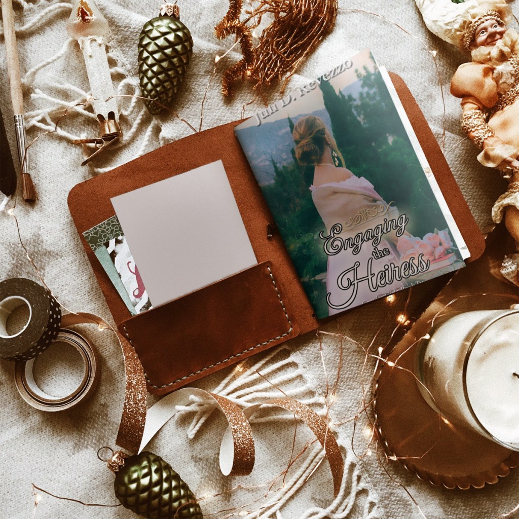 Merry Christmas banner with Engaging the Heiress by Juli D. Revezzo, Victorian romance, ebook sale, Smashwords Year end sale 2025